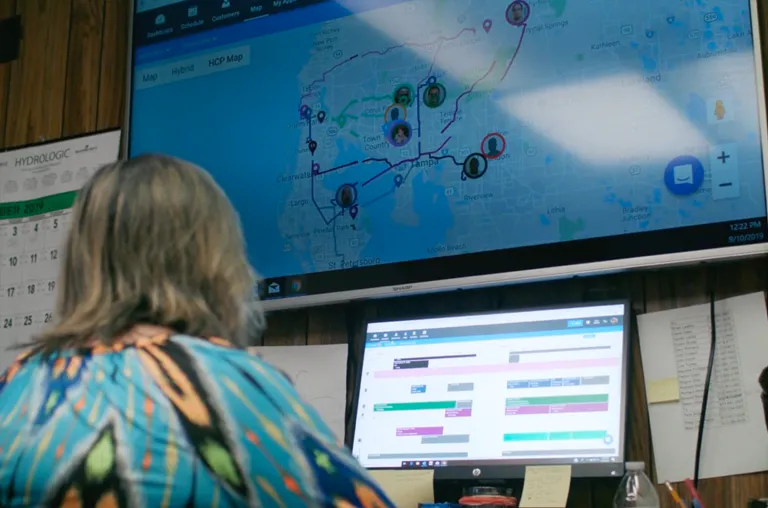 HCP dispatch software & map view on big office TV screen